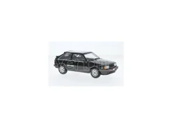 WHITEBOX WB124222 MAZDA 323 4WD TURBO BLACK/MET.DARK GREY 1:24 Modellino